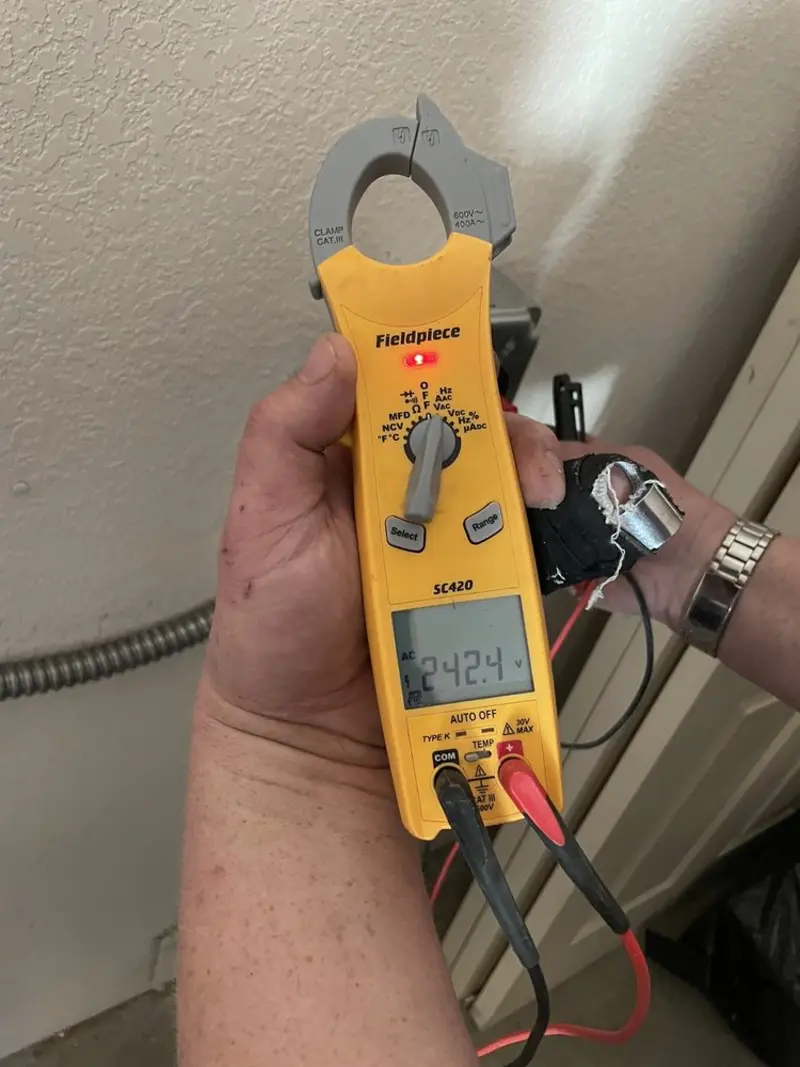 Voltage testing with clamp meter during Circuit Breaker Repair in Muncy Creek